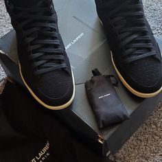 Suede Black Saint Laurent Sl/10 Sneakers In Sz. 40.5 Which Fits Like A Us 8.5. Sneakers Are In Great Condition. Like New. Comes With Box, Dust Bag And Extra Pair Of Waxed Laces. Retails For $625. Selling For $190 Modern Black High-top Sneakers With Gum Sole, Luxury Leather Low-top Basketball Shoes, Luxury Low-top Leather Basketball Shoes, Leather High-top Sneakers For Sports With Branded Heel Counter, Black High-top Sneakers With Branded Heel For Streetwear, Black High-top Sneakers For Streetwear With Branded Heel, High-top Suede Sneakers With Branded Heel Counter, Black High-top Sneakers With Branded Heel Counter, Leather High-top Skate Shoes With Branded Heel