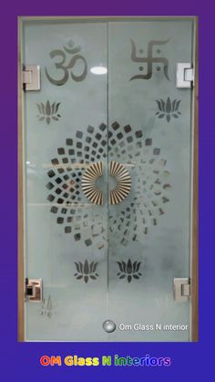 the glass door is decorated with an om manicure on it's front and side panels