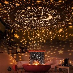 a room with stars and lights on the ceiling