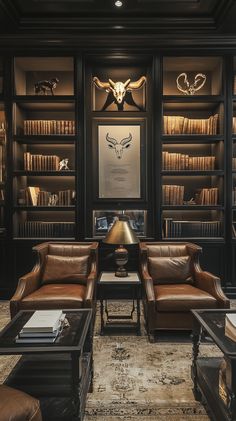 a living room filled with brown leather furniture and bookshelves full of deer heads