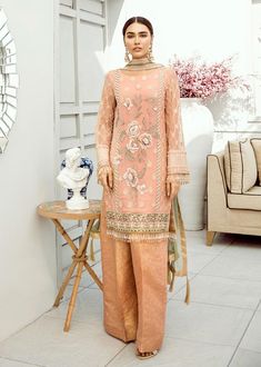 Peach Chiffon Dress Peach Dress With Intricate Embroidery For Eid, Elegant Peach Designer Wear Dupatta, Elegant Peach Dupatta For Eid, Elegant Peach Sharara For Reception, Elegant Peach Sets For Eid, Elegant Unstitched Peach Set, Semi-stitched Peach Dress With Dupatta, Eid Dresses With Dabka Work In Peach, Elegant Peach Unstitched Suit With Dupatta