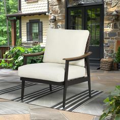 a white chair sitting on top of a patio