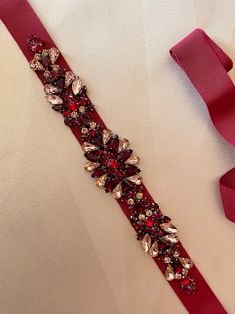 Garnet Rouge Red Wine Rosegold Blush Pink and Siam Chianti | Etsy Elegant Red Wedding Sash, Elegant Embellished Bridal Belt For Party, Elegant Bridal Belt For Wedding And Festive Occasions, Elegant Rhinestone Party Sashes, Elegant Red Sash For Party, Elegant Red Party Sash, Elegant Embellished Party Sash, Festive Party Embroidered Bridal Belt, Red Embellished Party Jewelry