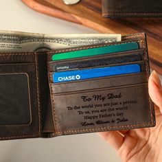 This wallet can be personalized with the monogram of your choice, making a special gift that will be cherished for years to come. You can add a custom message on the inside (up to 20 words) to have a perfect present for groomsmen, husbands, boyfriends or fathers. * Materials: Genuine Leather * Dimensions: 4 3/8"" x 3 1/2"" x 5/8"" (11x9x1.5 cm) * Features: - 1 money slot - 5 card slots - 2 hidden slots. Engraving font: Font design and size is as in photo. If you wish to engrave it bigger, please Personalized Leather Trifold Wallet Gift, Customizable Brown Wallets For Personalized Gift, Customizable Rectangular Wallet For Personalized Gifts, Personalized Rectangular Wallet For Father's Day, Father's Day Gift Trifold Wallet With Card Slots, Customizable Wallets For Father's Day, Customizable Wallets For Father's Day Personalized Gift, Father's Day Trifold Wallet With Card Slots, Father’s Day Gift Trifold Wallet With Card Slots