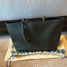 Great Condition. Does Have Some Wear On The Bottom Corners (Pictured). I Believe I Paid About $400 New. Comes With Dust Cover. Dimensions Are 15 Inches From Side To Side, 11 Inches Tall, 6 Inches Wide. Straps Measure About 10 Inches From Bag To Shoulder. Tory Burch Tote, Tory Burch Bags, Tory Burch Bag, Dust Cover, Wide Straps, Womens Tote Bags, 11 Inches, 6 Inches, Tory Burch