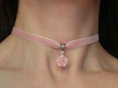 "Velvet light pink ribbon choker with sculpted powder pink rose. Material of rose is polymer clay. Each petal of flower made by hand Dia flower about 13-15 mm/0.45- 0.55 \" Length of necklace is adjustable:  10-12 inches/ 25,4 - 30,5 cm 11-13 inches/ 28-33 cm 12-14 inches/ 30.5- 35.5 cm 13-15 inches/ 33-38 cm 14-16 inches/ 35.5 cm-40.5 cm 15-17 inches/ 38,1 cm- 43,2 cm 16-18 inches/ 40.6 cm- 45.7 cm 17-19 inches/ 43 cm - 48 cm 18-20 inches/ 45,5- 50.8 cm      Τhe length you choose considered to be with lobster clasp and one connecting ring +2 inches extended chain. Width of ribbon 10 mm / 0.4 inch If you need other length of necklace let me know and I will make it for you. Polymer clay isn't afraid of water, strong and non-toxic. Gorgeous gift for women and girls as handmade item ALL CHOKE Pink Rose Jewelry, Pink Ribbon Choker, Pink Necklaces, Pink Choker Necklace, Eyeliner Glitter, Pink Flower Necklace, Pulseras Kandi, Rose Accessories, Rose Choker