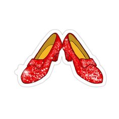 a pair of red shoes with glitter on them