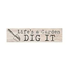 a sign that says life's a garden dig it with a spatula and spoon