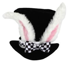 a black hat with white rabbit ears and a checkerboard bow tie on it