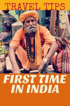 an old man sitting on the ground with his hands in his pockets, and text reading travel tips first time in india