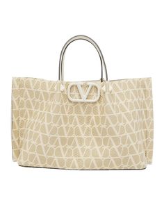 Valentino Garavani tote bag in VLOGO iconographe leather, metal, and raffia  Flat top handles with Roman Studs  Open top  Interior, leashed zip pouch bag  Feet protect bottom of bag  Approx. 9.8"H x 13.8"W x 6.7"D Made in Italy Raffia Tote Bag, Zip Pouch, Flats Top, Open Top, Pouch Bag, Shades Of Red, Italian Design, Valentino Garavani, Neiman Marcus