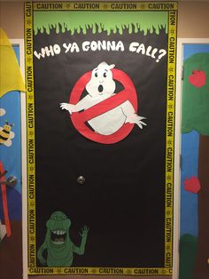 a door decorated with an image of a ghost and the words who ya gonna call?