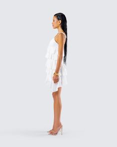 Show off all of your layers in this ivory tiered ruffle dress 🤍 Made from georgette fabric and complete with an A-line design and invisible zipper - this simple yet playful look is perfect for all of your rendezvous 😏 Tiered Chiffon Mini Dress For Brunch, Tiered Ruffle Dress With Layered Hem, Tiered Chiffon Mini Dress With Ruffles, Chic Chiffon Tiered Ruffle Dress, Flowy Tiered Party Dress, White Tiered Dress For Party, White Flowy Ruffle Dress With Ruffled Straps, White Ruffle Dress With Flowy Ruffled Straps, White Flirty Mini Dress With Ruffled Skirt