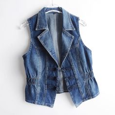 Please note this is in Asian sizing, smaller than western size e.g. UK, US, AU. Women Denim Waistcoat Vest Tank Tops Retro Gilet Jacket Coat Chinese Ethnic Vest Please check the measurements carefully before making a purchase. Please allow 2-4cm discrepancy due to different measurement method. If you are not sure which size to buy, please provide height and weight, we will recommend a suitable size. Photos may slightly different from actual item's color due to the lighting during photo shooting Sleevless Jacket, Womens Denim Vest, Vests Women, Denim Waistcoat, Streetwear Denim, Jeans Coat, Denim Vests, 2024 Spring Summer, Jean Vintage