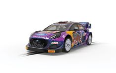 a purple car with colorful paint on it's body is shown in front of a white background