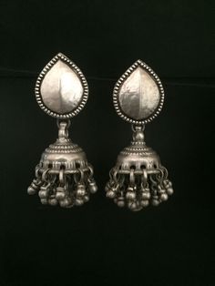 Handmade item (Earring Jumke ) Materials:  Silver Style: Traditional Description:-  Antique silver 925, Gemstone Engagement , Anniversary , Honeymoon, First Date for Women, Traditional Earring - Jhumki , Gift for Her Metal :- SOLID 925 sterling silver  Weight-42.61 grams apx ( Earrings are same as shown in the pictures. We have only one piece in this style and colour, hence you get what you see in the picture ) Package - Individual gift wrapped box How to care:- The sterling material itself is soft, this ring band is thin, please avoid any serious collision and squeezing, because this may make the ring bent or stone fall out, we recommend you to buy a larger half size ring to make finger loose, this will avoid any squeezing. Handmade Jewelry By Vidita Jewels Contact us if any other questio Traditional Earrings For Celebration, Temple Jewelry Danglers As Gift, Handmade Silver Fusion Style Jhumkas, Handmade Silver Fusion Jhumkas, Sterling Silver Bohemian Jhumkas, Bohemian Sterling Silver Drop Jhumkas, Sterling Silver Danglers For Wedding, Silver Fusion Style Drop Jhumkas, Sterling Silver Danglers For Festivals And Celebrations