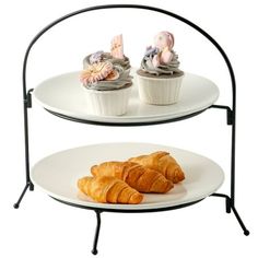 two tiered trays holding pastries and croissants