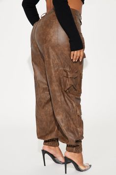 Available In Brown. Washed Faux Leather Jogger High Rise Button & Zip Closure Hand & Back Pockets Cargo & Utility Details Non Stretch Shell Coating: 100% Polyurethane Basic Fabric/Lining: 100% Polyester Imported | Weekend Warrior Washed Faux Leather Cargo Jogger Pant in Brown size XL by Fashion Nova Casual Faux Leather Cargo Pants With Pockets, Casual Faux Leather Pants With Side Pockets, Utility Faux Leather Pants With Pockets, Utility Faux Leather Bottoms For Fall, Faux Leather Utility Bottoms For Fall, Casual Faux Leather Cargo Pants With Belt Loops, Casual Faux Leather Cargo Pants For Streetwear, Casual Faux Leather Cargo Pants, Faux Leather Cargo Pants For Fall Streetwear