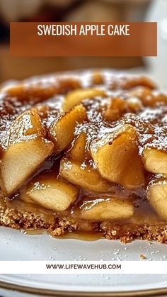 a close up of a pie on a plate with the words swedish apple cake above it