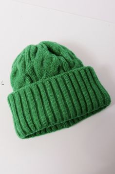 Stay warm and stylish year-round with the Free People Coastline Beanie. This classic beanie features cable detailing and a ribbed cuff for added dimension. Perfect for any look, this staple piece will be your go-to choice no matter the season. Green Winter Hat, Green Clothing, Winter Hat, Staple Pieces, Bright Green, Clothing And Accessories, Stay Warm, Winter Hats, Free People