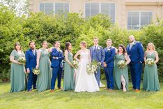 a bride and groom with their bridal party