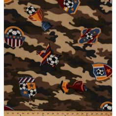 a camouflage print fabric with soccer balls and stars on the front, in brown and orange