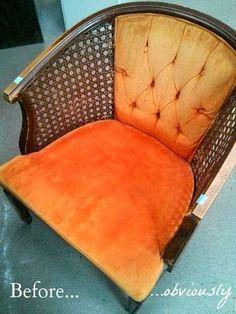 an orange chair sitting on top of a blue floor