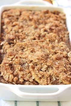 a casserole dish with oatmeal topping in it