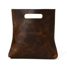 Elevate your everyday style with this Brown Women's Leather Purse which exudes timeless elegance. Crafted from durable buffalo leather, it's designed to carry all your essentials, from books, Kindle, and journals to stationery, phone, and wallet. Versatile and chic, it's perfect for a lunch party, a social gathering, or a casual brunch with friends. With ample space and timeless design, this purse is both fashionable and functional, making it an essential addition to your collection. Salient Fea On-the-go Rectangular Soft Leather Clutch, Rectangular Faux Leather Wallets For Daily Use, Rectangular Faux Leather Wallet For Daily Use, Brown Rectangular Clutch For Everyday Use, Daily Use Faux Leather Rectangular Wallet, Daily Use Rectangular Faux Leather Wallet, Everyday Use Rectangular Clutch With Leather Handles, Brown Bifold Bag With Interior Card Slots, Brown Leather Handle Clutch For Daily Use