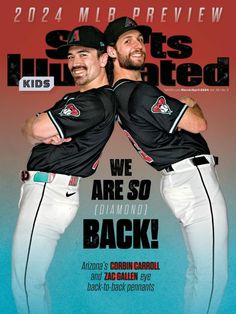 two baseball players standing next to each other