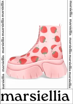 a pink boot with strawberries on it and the words margiella written below