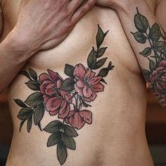 an image of a woman with flowers on her stomach and the caption that says, i