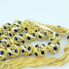 "Including the Silver Cord. It will be sent in lux gift box. General: 33 pcs Ø7.5x8 mm beads size Weight: 38.2 grams Length: 26 cm including tassel Material: 925 sterling silver, gold plated, Sapphire. See our other models here: http://www.etsy.com/shop/Tesbih?ref=si_shop Hand-made. Do not compare it to products sold in the shops. Each one makes the master. Tried using the most robust rope. Disperse a day in two days. Remain intact for many years. Does not Tarnish metals were used. The unique de Spiritual Gold Necklace With Silver Beads, Traditional Gold Beaded Rosary, Gold Beads With Silver Details As A Gift, Lux Gifts, Islamic Prayer, Star Sapphire, Prayer Beads, Gold Plated Silver, Handmade Shop