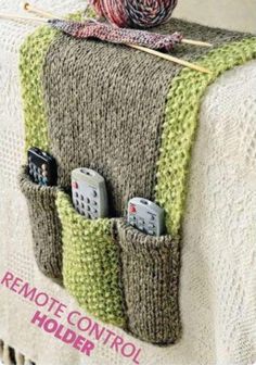 a knitted blanket with two cell phones in it