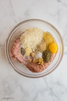 ingredients in a glass bowl on a white marble counter top with the words mix it up above them