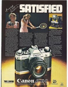 an advertisement for a canon camera featuring a woman holding a tennis racquet in front of the camera