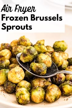 a white plate topped with brussel sprouts