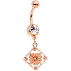 Product DetailsClear Gem Rose Gold Tone Art Deco Elegance Dangle Belly Ring Get your flapper dress and prepare to dance the Charleston....this navel ring will take you right back to the 1920's! It's 14 gauge and made with a 7/16" rose gold tone over durable 316L surgical grade stainless steel curved barbell. It has a 5mm top ball end and an 8mm bottom ball end inset with a clear gem. But it's the dangle that is truly stunning. A lacy looking rhombus features a circle at its center, with a clear gem set right in the very middle to perfectly highlight the belly button ring's retro appearance. Don't be fooled by the delicate look of the styling though, this belly ring is built to last. And regardless of what year it is, with such timeless beauty, you'll never want to take it off.Specification Gold Belly Button Rings, Bellybutton Piercings, Belly Button Piercing Jewelry, Tone Art, Belly Piercing Jewelry, Button Piercing, Jewelry Promotion, Gold Body Jewellery, Navel Jewelry