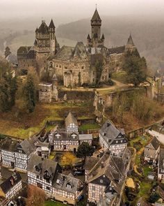 an aerial view of a castle like building