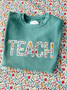 Teacher Embroidery Sweatshirt, Teacher Applique Designs, Teach Embroidery Sweatshirt, Future Teacher Shirt, Teaching Shirts Ideas, Teacher Shirts Designs Vinyl, Embroidered Teacher Gifts, Applique Sweatshirt Ideas, Reverse Applique Sweatshirt