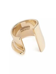 From the Le Chouchou Collection. This Jacquemus J ring offers a sculptural, asymmetric design crafted of gold-plated brass..Gold-plated brass.Made in Italy.From the Le Chouchou Collection. This Jacquemus J ring offers a sculptural, asymmetric design crafted of gold-plated brass.Gold-plated brassMade in Italy Modern Brass Ring With Polished Finish, Modern Brass Rings With Polished Finish, Modern Brass Open Ring, Gold-tone Polished Metal Rings, Gold-tone Polished Brass Rings, Gold-tone Metal Rings With Polished Finish, Gold-tone Brass Rings With Polished Finish, Modern Gold-plated Gold-tone Rings, Modern Gold-tone Gold-plated Rings