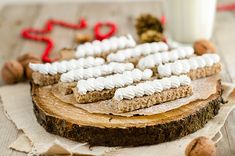 a wooden board topped with cookies and marshmallows