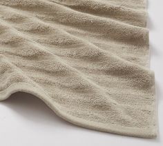 a close up of a towel on a white surface with no one around it or someone else