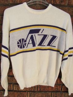 a white sweater with the word jazz on it