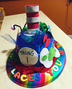 a cat in the hat birthday cake on a table