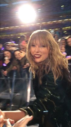 taylor swift in the audience at an event