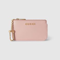 "Find GUCCI Zip Key Case With Script Leather on Editorialist. The Pre-Fall accessories spotlight essential silhouettes with emblematic details for day to evening. This zip key case, featuring an inside hook, appears in light pink leather and sports the Gucci script detail across the front in light gold-toned hardware. Light pink leather, Light gold-toned hardware, Taffeta lining, Gucci script detail, Inside hook, Zip closure, Weight: 0.14lbs approximately, 4.9\"W x 2.7\"H x 0.6\"D, Made in Italy" Gucci Key Pouch, Designer Key Holder, Car Keychain Ideas, Key Pouch, Designer Wallets, Pretty Bags, Fall Accessories, Gucci Accessories, Key Case