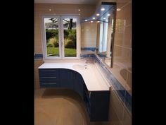 a bathroom with a sink, mirror and bathtub