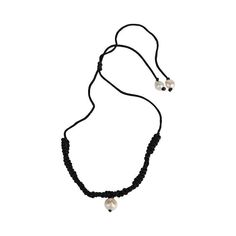 The 'chocker' style TARA necklace is a contemporary take on a timeless classic. The macrame, made on a sophisticated black thread, brings an artistic touch to this audacious piece. At the center of this creation, a natural freshwater pearl captures the light with its pearly glow. This bead, a symbol of purity and organic beauty, contrasts strikingly with the modern aesthetic of macrame. This surprising alliance creates a balance between the traditional and the contemporary, between the chic and Elegant Black Necklace With Adjustable Cord, Elegant Silk Cord Necklace For Gift, Adjustable Black Necklaces With Pearl Charm, Adjustable Black Pearl Necklace With Pearl Charm, Adjustable Black Pearl Necklace With Charm, Minimalist Choker Necklace With Adjustable Cord, Minimalist Adjustable Cord Choker Necklace, Handmade Adjustable Minimalist Pearl Necklace, Minimalist Choker Necklace With Sliding Knot