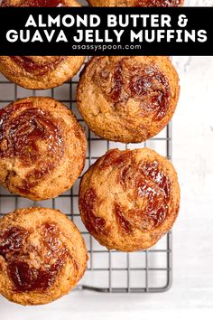 almond butter and guava jelly muffins on a cooling rack with text overlay